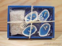 Muschelkerzen in einer Holzbox